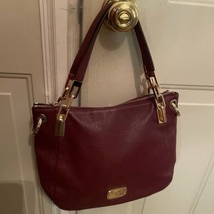 Women’s Michael Kors medium size purse - burgundy